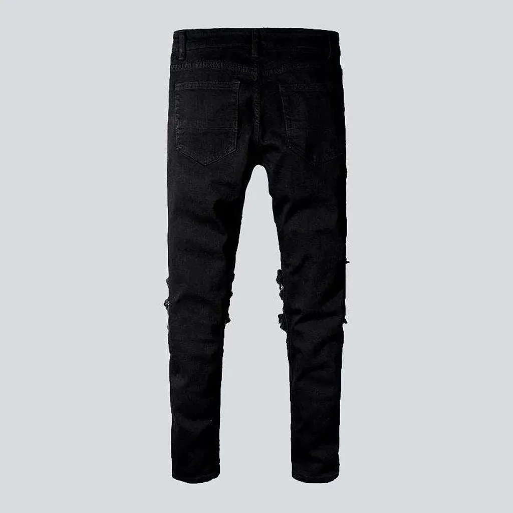 Black patch skinny biker jeans