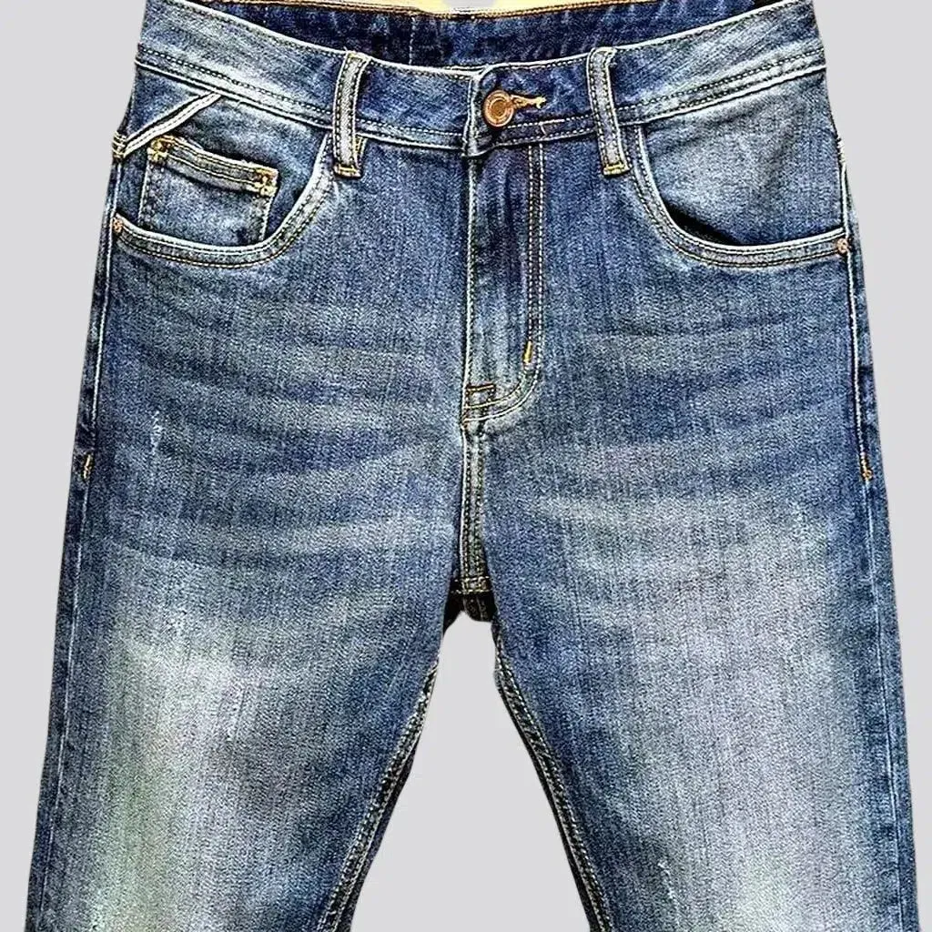 Medium wash men's slim jeans