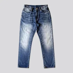 Vintage medium wash tapered men's jeans