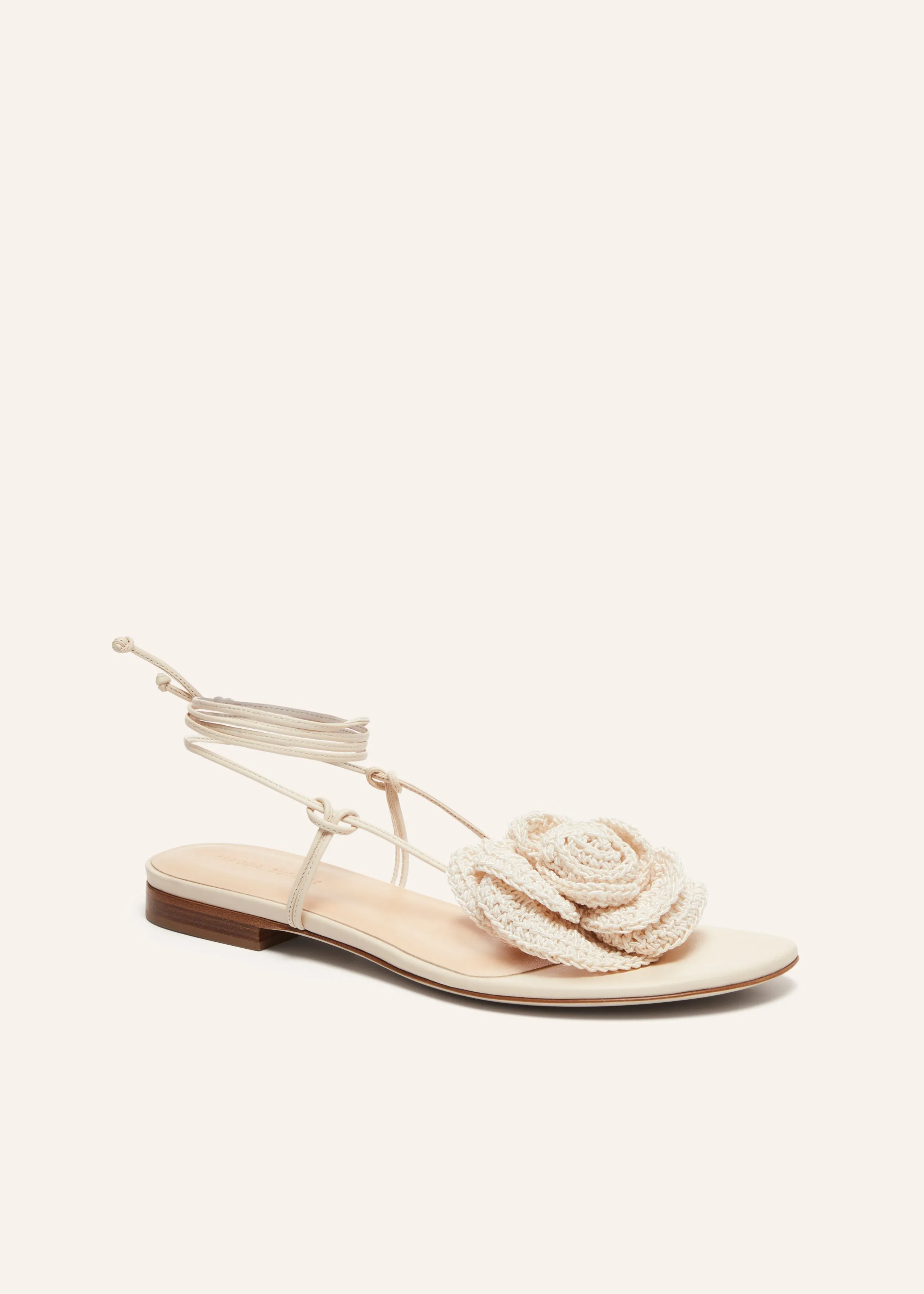 Wrap around flat flower sandals in cream crochet